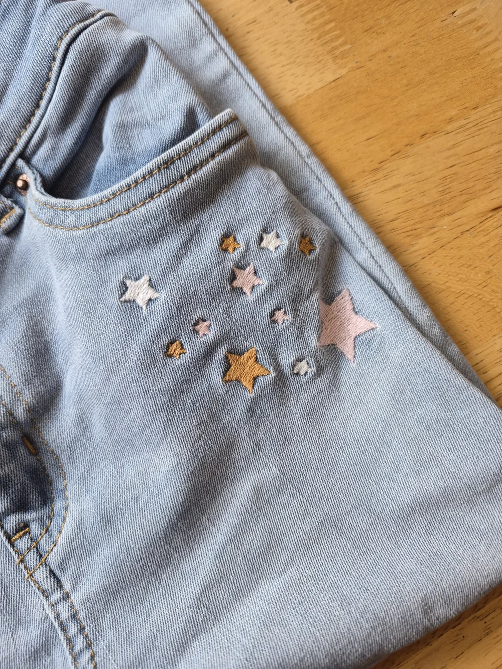 Levi's Light Wash High-Rise Jeans with Star Embroidery